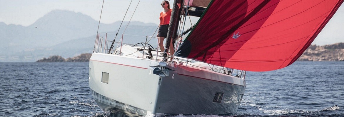 Captain George sailing with red sail